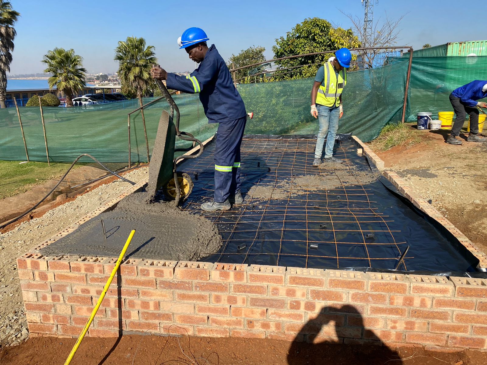 Pouring a reinforced concrete tank base